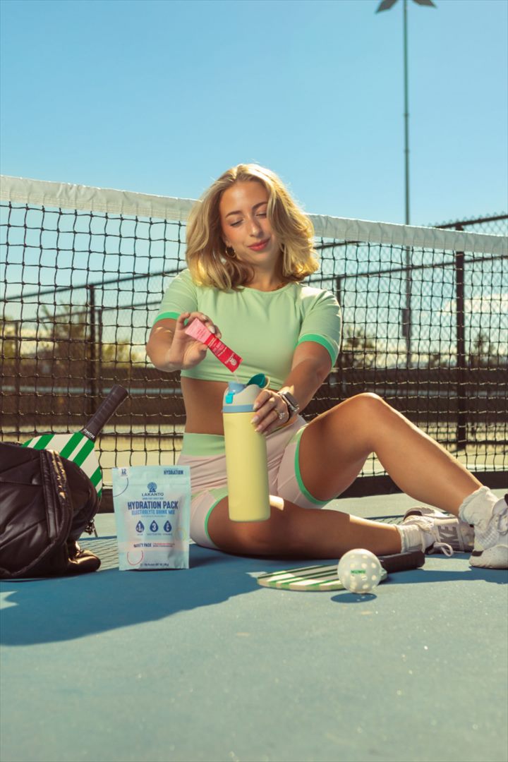 Sports creator demonstrating a hydration product