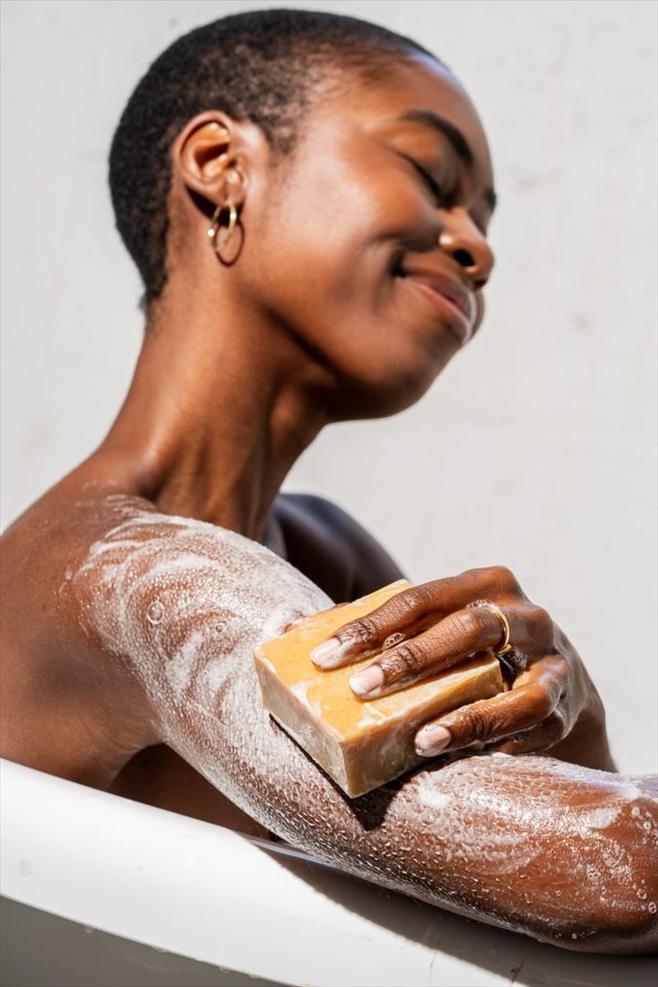 Beauty creator demonstrating a skincare product
